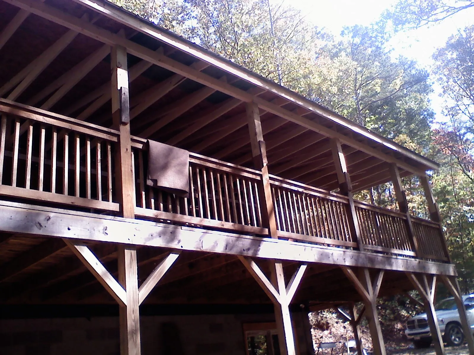 Timber framing under a new elevated porch and deck — Roof Leak Repair in Tamiment by Roofing Brothers